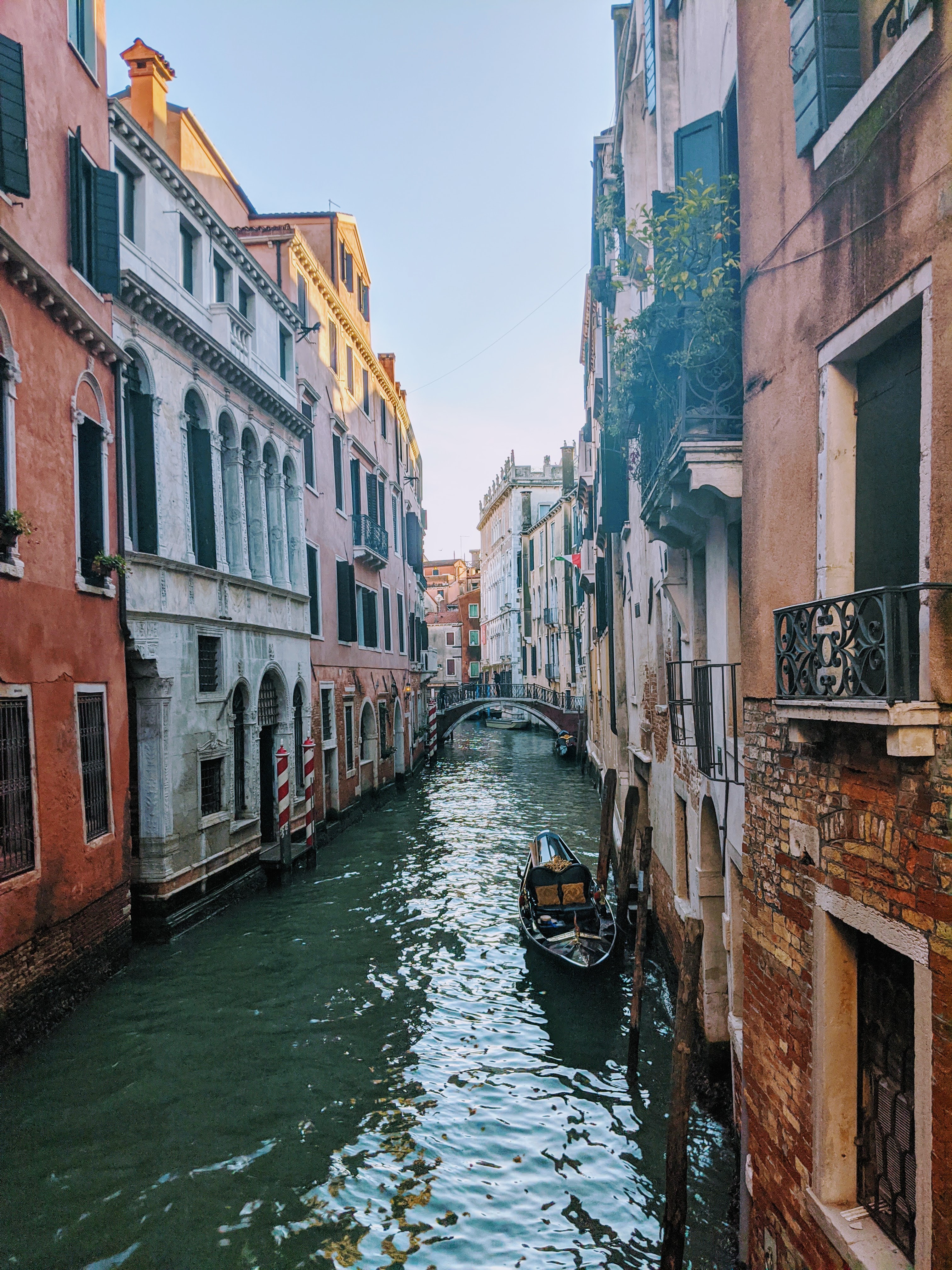 A canal with colorful buildings on the sides in Venice, Italy